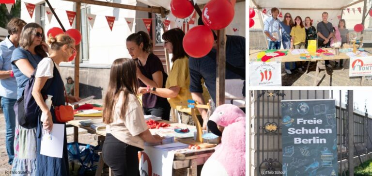 Menschen stehen vor einem bunt geschmückten Marktstand und sprechen miteinander.